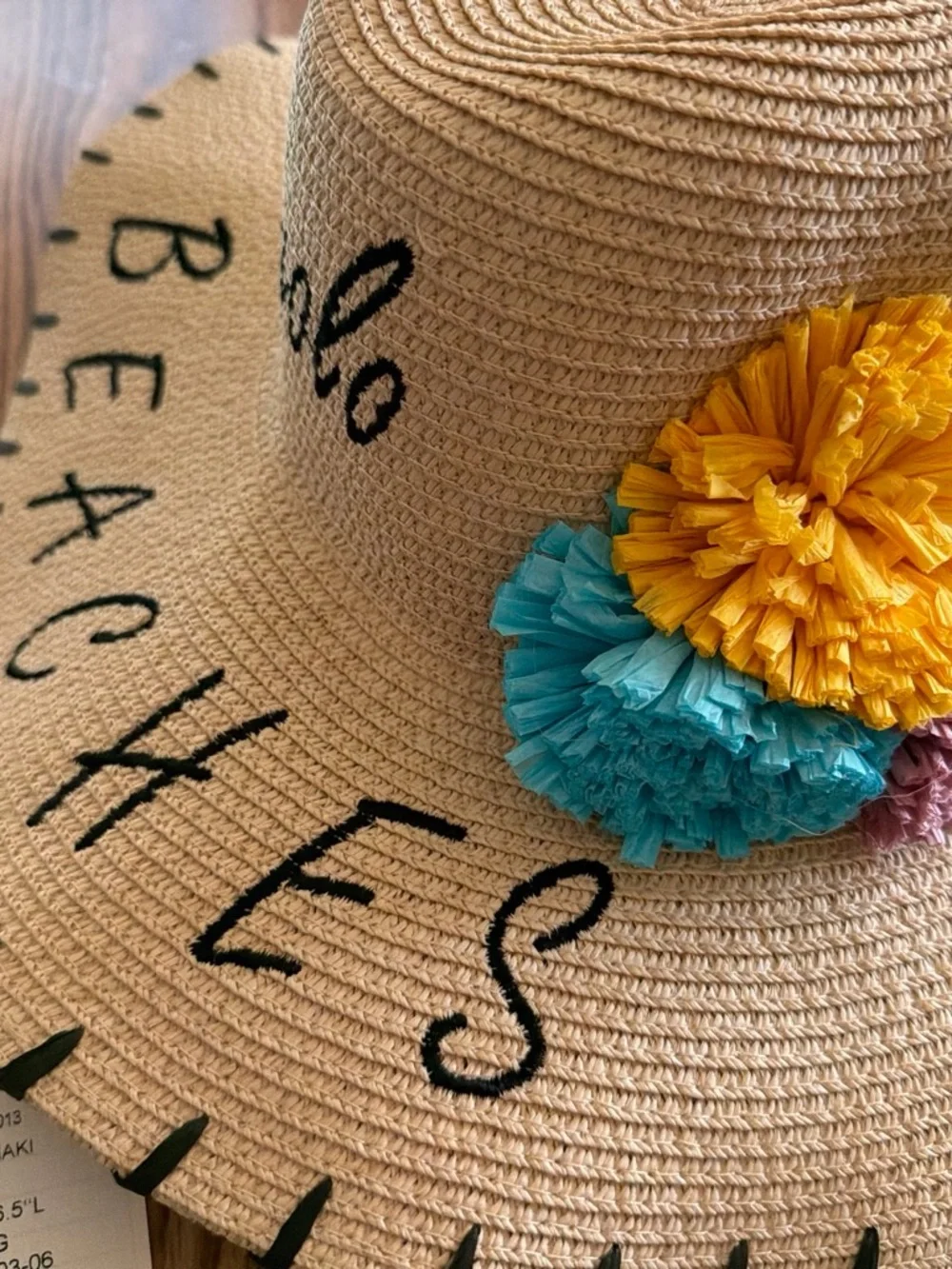 Straw Sun Hat with Yellow & Teal Flower Accent -